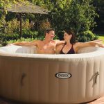 Portable inflatable hot tub with bubble massage