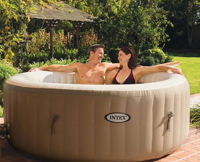 Portable inflatable hot tub with bubble massage